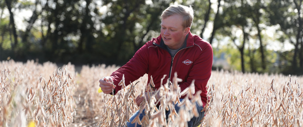 KUHN Jacket on man in soybean field